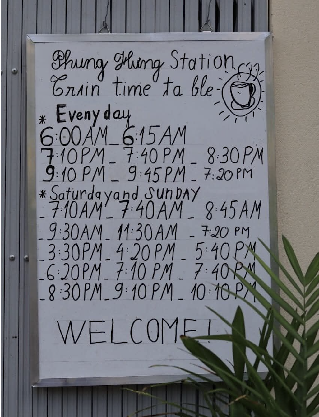 Phung Hung Station Hanoi Train Street schedule board showing train times in Old Quarter Vietnam
